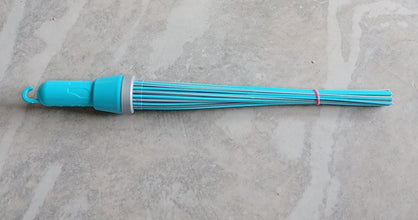 Plastic broom for cleaning, showing bristles and base