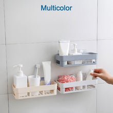 Wall-mounted shower corner caddy with suction cup