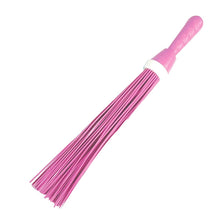 Efficient plastic broom for cleaning floors, effective on both wet and dry surfaces.